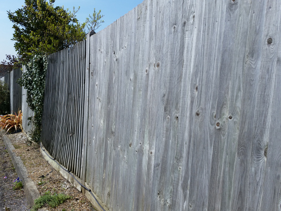 Wind Damaged Wooden Fencing