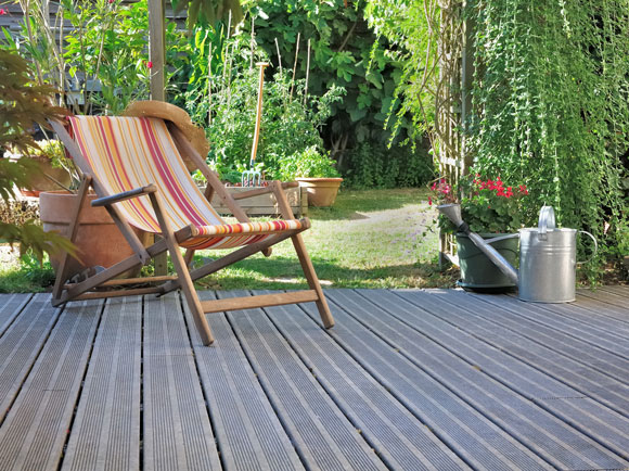 garden decking that has been swept and cleaned