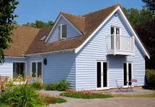Sadolin Superdec: 3 Years Later – How Did It Perform? Colourful weatherboarded house using Sadolin Superdec