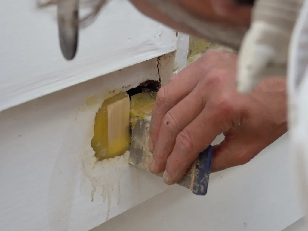 Shaping DRY FLEX into the corner of a timber section